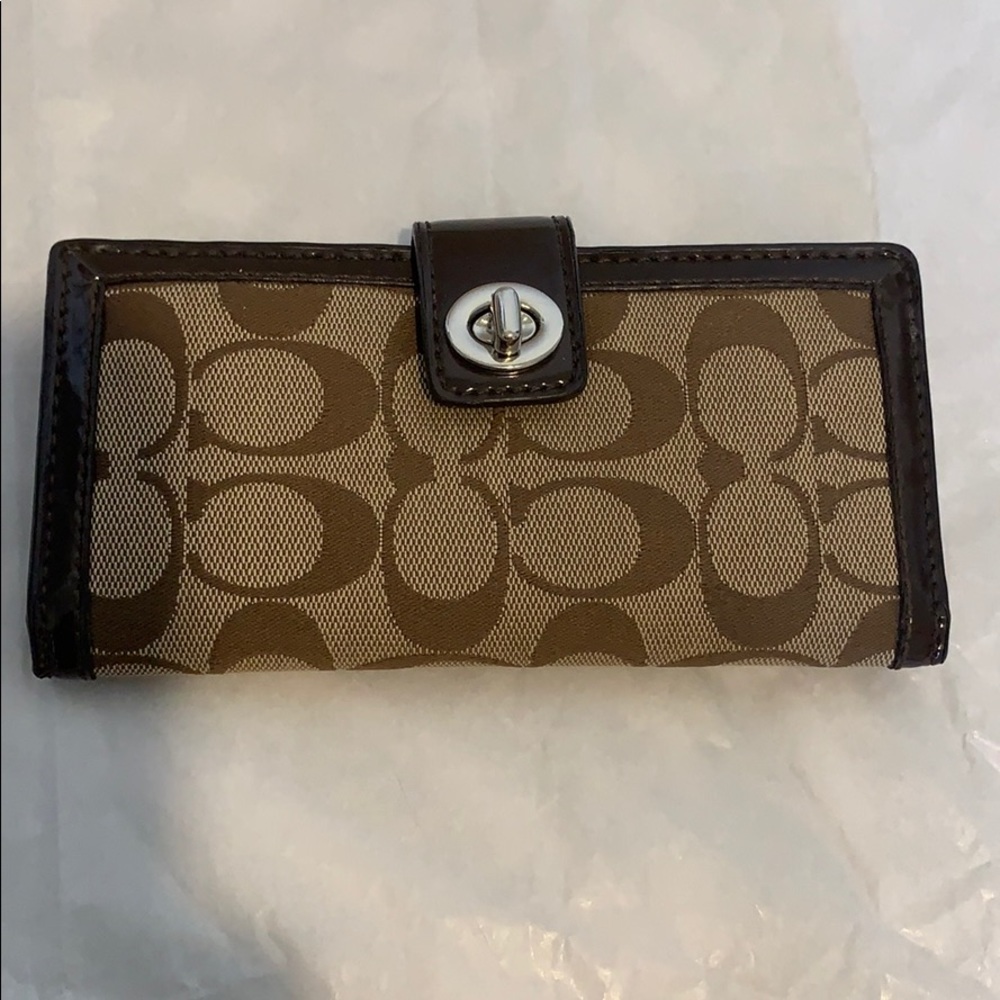 Coach bifold Wallet with front twist lock